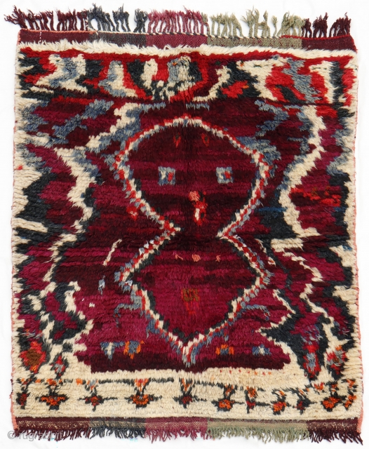 This Persian gabbeh has the most peculiar design that we have probably seen since we began our journey in the world of rugs in 1997. A figure that could be a bird,  ...