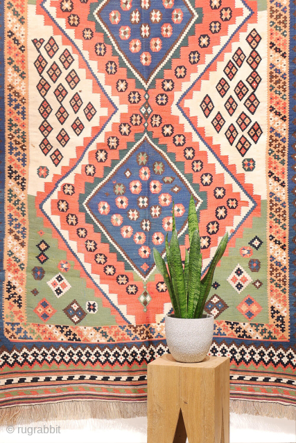 Antique Qashqai Kilim with and Unusual Green Palette

This antique Qashqai kilim follows traditional tribal patterns—but with a distinctive twist. While it retains the classic diamond medallion structure typical of Qashqai weaving, what  ...