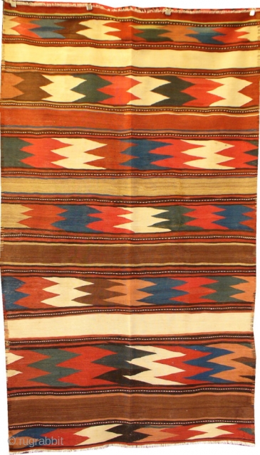 North West Iran or South Caucasian kilim.
19th century kilim tightly woven with shiny wool and in mint condition. Nice details highlighting the kilim side edges.
252x158cms
        