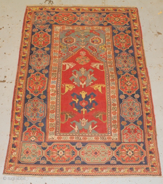 17th century transylvanian prayer rug ,rewoven and old repairs size 188cmx125cm.                      