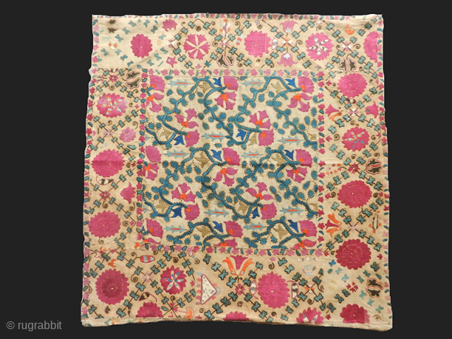 Suzani fragment. Silk on cotton. Early 19th. century. Cm. 80 x 80. Very rare design.                  