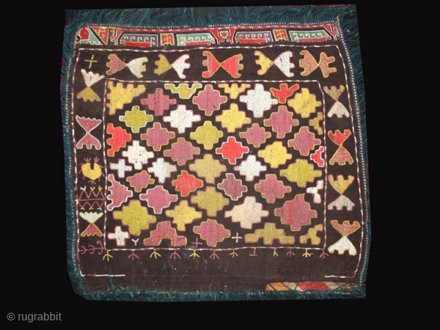 Mirror cover cod. 0047. Early 20th. century. Silk embroidery on cotton. Kungrad people. Central Asia. Size cm. 64 x 80 (25 x 32 inches). Sewn onto a black cotton ground and mounted  ...