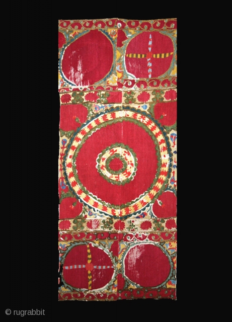 Suzani fragments cod. 0494. Silk embroidery on cotton, traditional dyes. Central Asia. Mid. 19th. century. Very good condition. Cm. 65 x 150 (2'2" x 4'11"). Professionally sewn onto a cotton black ground  ...