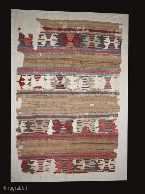 Kilim fragment cod. 0666. Central Anatolia. Early 19th. century or before. Cm. 97 x 145 (38 x 57 inches). Mounted on linen.           