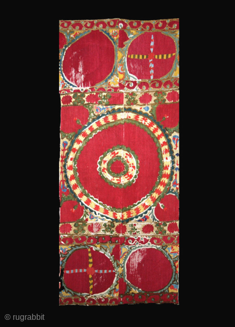 Suzani fragments cod. 0494. Silk embroidery on cotton, traditional dyes. Central Asia. Mid. 19th. century. Very good condition. Cm. 65 x 150 (2'2" x 4'11"). Professionally sewn onto a cotton black ground ...