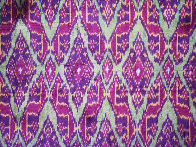 Ikat Sampot (Sarong)cod. 0680. Silk, natural dyes with brilliant colors. Cambodia. Circa early 20th. century. Extremely finely woven. Handstitched to form a tube. Dimension cm 180 x 90 (71" x 35")
The bold ...