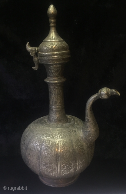 A rare circa 18th c Afghanistan brass ewer. Complete handcrafted 
And very finely hand carved. Height 16 inches               