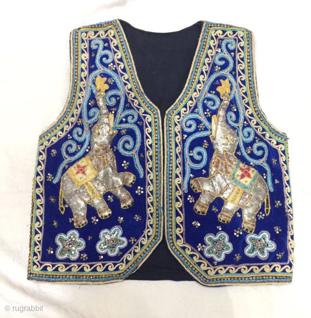 Vintage mid 20th century vest , very finely handcrafted , decorated with metal sequins                   