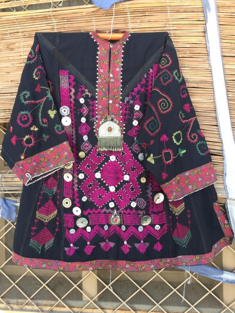 Tribal silk thread hand embroidered woman dresss from Kohistan region of northern Pakistan.In its best condition. 
                