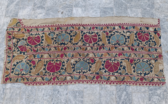 Antique Suzani textile from the 18th century.
A fragment or nearly complete textile. Silk embroidery.
A rare and high quality.
Size 67 × 29 inches 
For details please contact @ nooristanartgallery@yahoo.com     