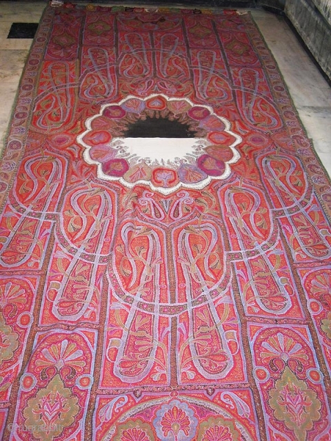 A very beautiful old Kashmir long shawl with a unique center which is not very easy to find,with a few small holes which is very normal in these type of vintage shawls.Colour  ...