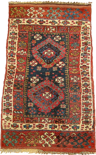 1A03  "Kurdish" design; pair of antique bagfaces joined; 1.8' x 2.7'                     