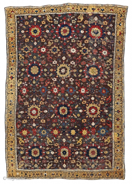 18th Century Karabagh carpet. It has been shorten and have lot of wear and tear, repairs, re-knottings etc. 

Ca 3x2 Meters            