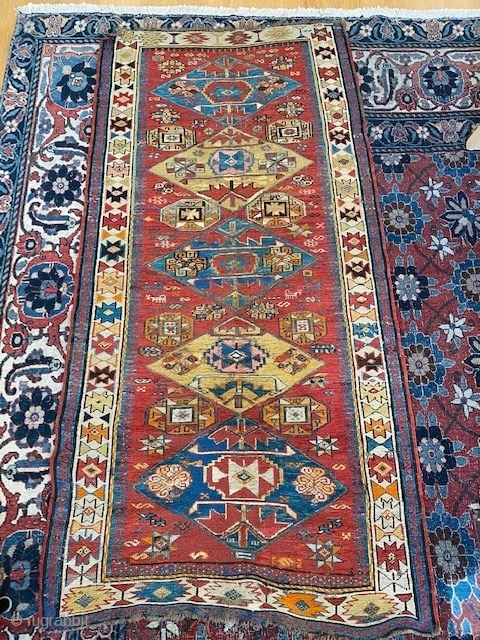 Caucasian Soumak late 19 century. 

Repairs, missing short boarder and wear. 

2'10 x 5'5 (86 x 165 cm)               