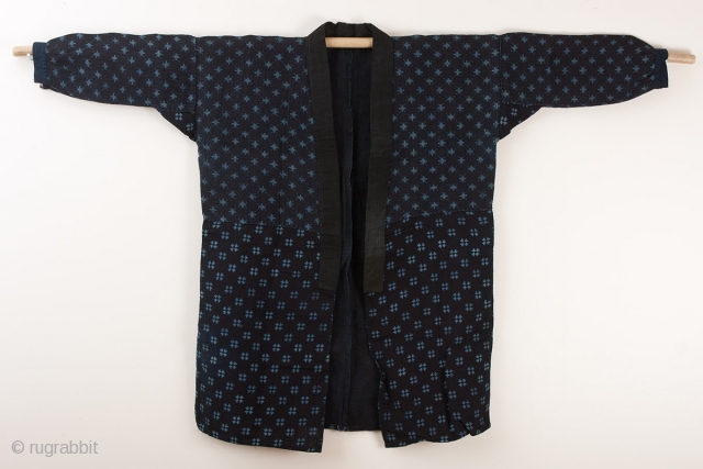 This is a Japanese farmer's jacket made of indigo dyed hemp. What is striking about this jacket is that the garment was first dyed to a pale indigo blue before the rice  ...