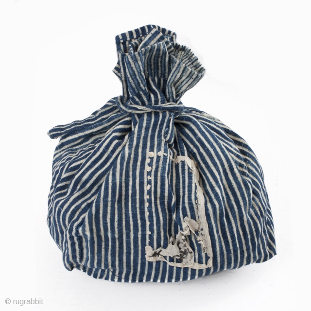 This is a gorgeous antique hand spun and handwoven Japanese cotton bag, that was once used to store urushi lacquer bowls. The stripes seen here were achieved using the stencil-dye technique known  ...