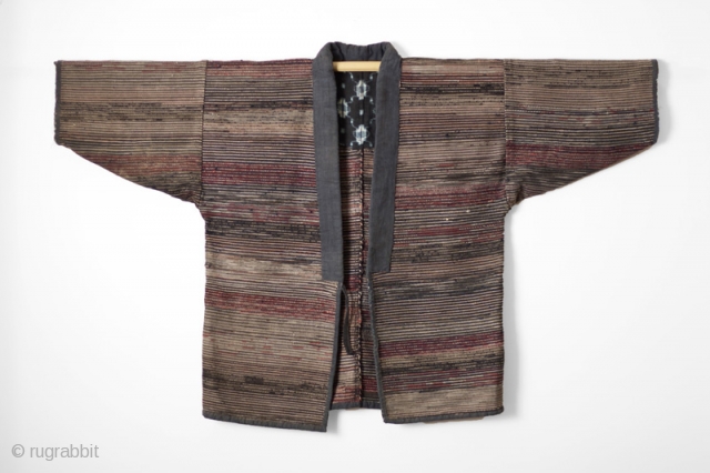 This is a handsome work jacket made entirely of sakiori in earthy and warm colors. Sakiori describes a weaving technique in which shreds torn from older cloth, such as kimono or futon,  ...