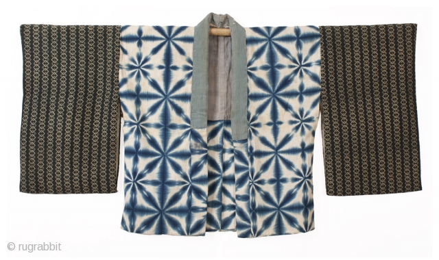 This is a striking shibori dyed han juban, which is often worn underneath a kimono. Shibori is a Japanese dying technique where patterns are made by binding, stiching, folding, twisting, and compressing  ...