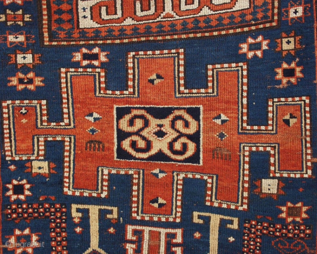 Bizarrely drawn and conditionally challenged Karachopf.  Very low pile overall, down to foundation in several places, esp. upper left quadrant; kilim and knots still intact on one end; two gashes in  ...