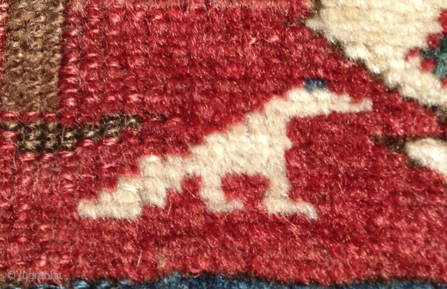 Two birds with one rug!  Kurdish (?), 19th century.  Coltrane-esque riff on an old Caucasian standard.  Beefy, floppy handle.  Glossy wool.  Excellent condition.  All organic dyes.  ...