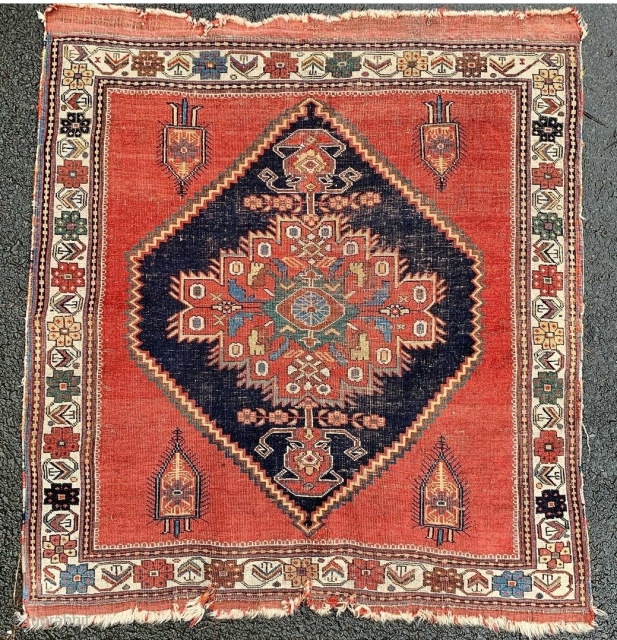 Afshar rug with a charming rendition of the classic single medallion design.                     