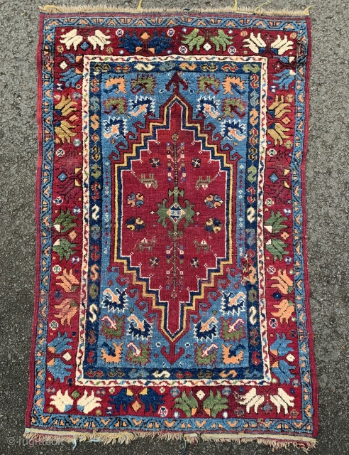 Antique Rabat rug. 19th century.165x103cm. A lovely colourful older example. Some wear and a small hole in the field.              