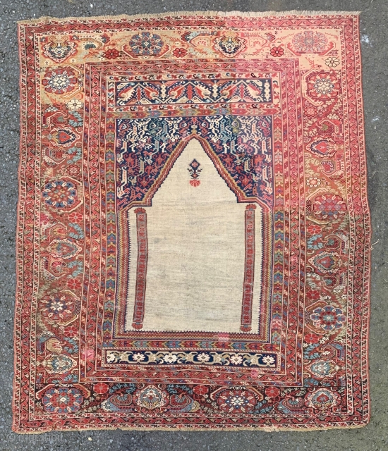 18th century Ghiordes prayer rug. Large border repair.                         