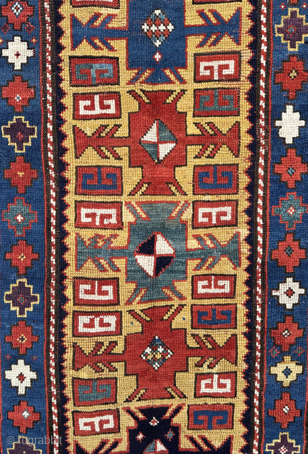 Antique Kazak rug. 19th century. This rug has a good design and particularly good colours. Minor edge repairs..               
