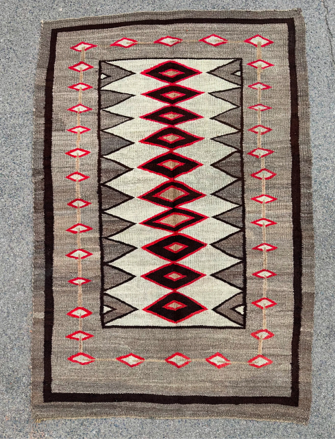 Antique Navajo rug. Early 20th century in good condition. 166x110cm                       