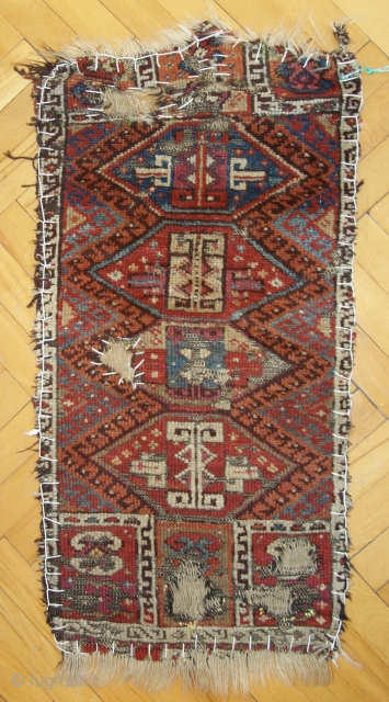 Eastern Anatolian yastik (needs restoration) 33" x 15" (84cm x 39cm).                      