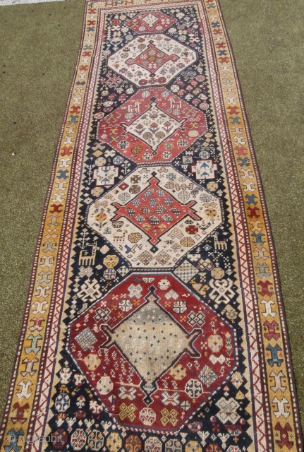 Old caucasian rug- Akstafa ?
Unusual size : 250*85
Nice design , overall good condition
P.cat
                    