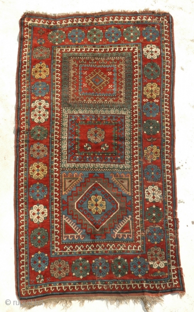 An Antique Kazak fragment, cut and reduced, you can see on the last two pictures.

size is 208 x 112 cm             
