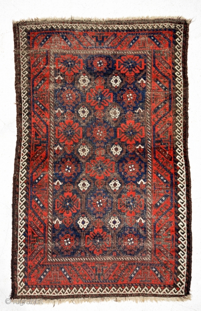 Baluch rug 1910, size is 185 x 103 cm, overall fair condition, black is too worn but flowers are in good condition. a good example of baluch.      