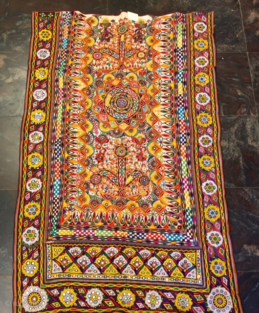 kutchi rabari wall hanging from bhujodi village in kutch region Gujarat with very fine chain stich hand work with mirrors work on it the kutchi rabari wall hanging is in very good  ...