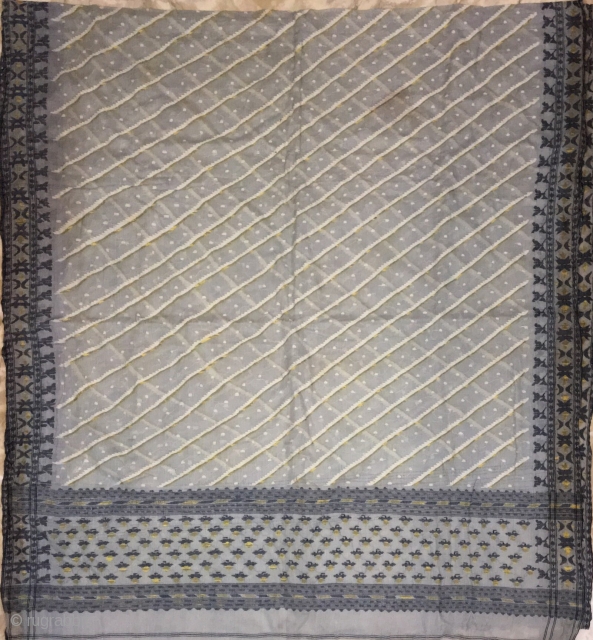 Vintage Dhakai sari from savar  city near Dhaka Bangladesh woven with finest Muslin with very fine real zari work in the sari .         