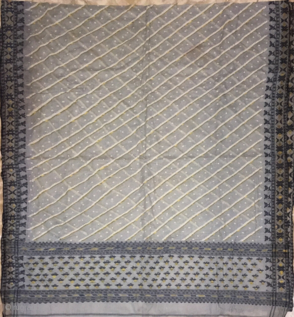 Vintage Dhakai sari from savar  city near Dhaka Bangladesh woven with finest Muslin with very fine real zari work in the sari .         