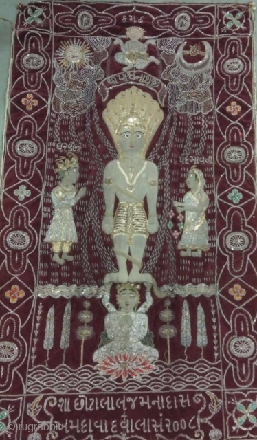 Real silver and gold foil work of Jain temple hanging hand embroidered from Gujarat India the size of the hanging is 23 inches X 37 inches.       