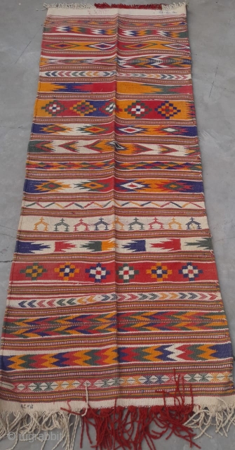 Durrie handwoven of cotton with vibrant colours with geometrical design all over from Thar desert region of Rajasthan India.the durrie is in very find condition without any holes or stains.the size of  ...