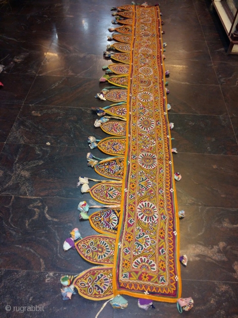 this is mochi aari toran long patti door hanging from kutch region gujarat of late 19th century which belongs to bhanushali kutch  in gujarat ,the size of the door hanging is  ...