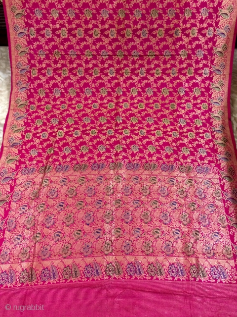 Vintage wedding  Banarasi saree  made in Varanasi India and worn by the royal family's in India this sari has two different kind of borders with very colourful flowers design to  ...