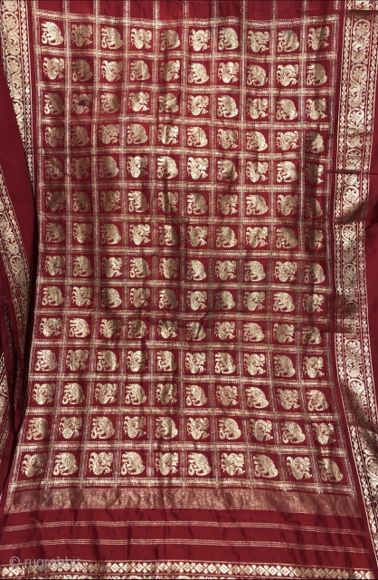 Vintage real zari sari with elephants and peacocks motifs all over gold on royal red colour made in Varanasi Uttar Pradesh India 1900c. on famous mulberry silk of Mysore the size of  ...