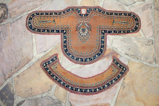 This is a unique and rare Motasham Kashan horse cover that measures 3.10x2.6ft. The center flower creates a dramatic colors contract against the orangey-colored field. This piece dates back to the 1880s  ...