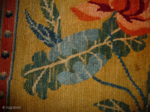attractive early 20th century yellow ground tibetan under saddle with flamming pearl minor border.                   