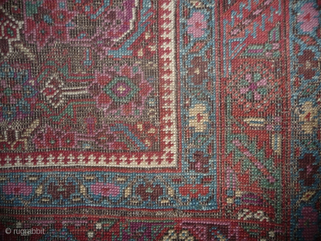 an early north-west persian long rug, possibly kurdish, with a very unusual colour palette, all natural with different purples and light indigo abrash. ends and selvedge partially worn but more or less  ...