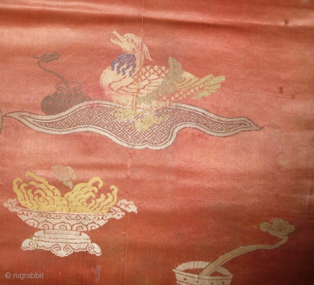 Portiere or door curtain from the qianlong era. interesting iconographie, complete but unfortunately with color damage mostly to the ground color. china 18th century approx. 90x190cm.       