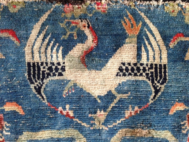 beautiful fragment of an early 20th century tibetan rug of an originally 230x 130cm size. rugs bigger than the common khaden size are not common in tibet.probably a piece made for the  ...