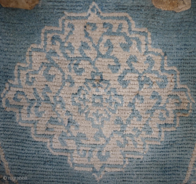 an extremly uncommon all cotton pile (the foundation is wool) tibetan horse cover with a rare design. good original condition. tibet, early 19th century or before. 130x 64cm     