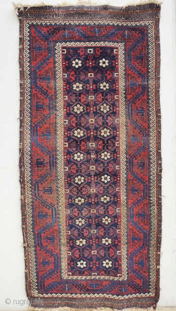 mina khani baluch main rug.
all there , corroded brown, a smalloldpatchinthemiddle.
depressed warps,velvety pile...heavy                    