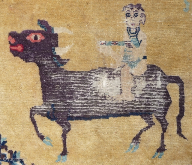 chinese rug with possibly some taoistic background as it possibly depicts an old well known  legend; laozi leaving china to the west (in yumenguan , if i remember well) and writing  ...