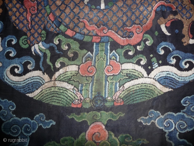 fragment of a 17th century dragon robe. silk brocade with gold threads. china, 62x 68cm                  